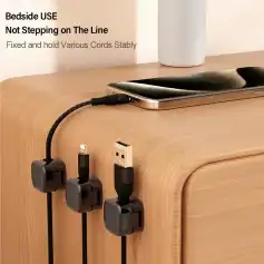 Versatile charger cord management for bedside use, keeping cords fixed and organized without stepping on the line, ideal for modern bedroom setups.