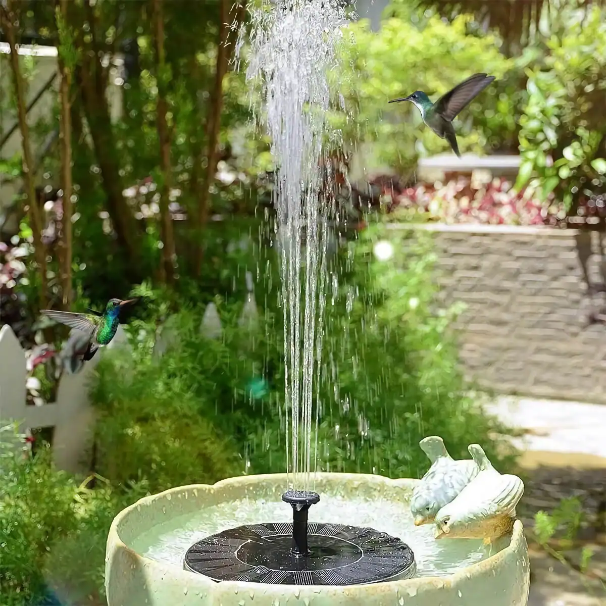 Beautiful garden fountain attracting hummingbirds and small birds, creating a lively outdoor space. Perfect for adding serenity and nature to your garden with elegant water features and bird-friendly design.
