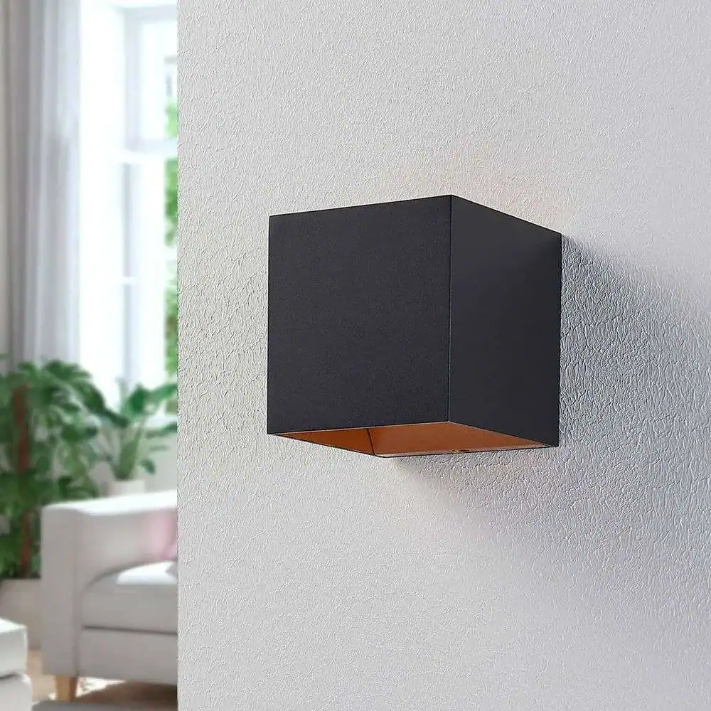 Elegant black wall sconce for home lighting, perfect for living rooms, bedrooms, and hallways, enhancing interior decor with stylish illumination.