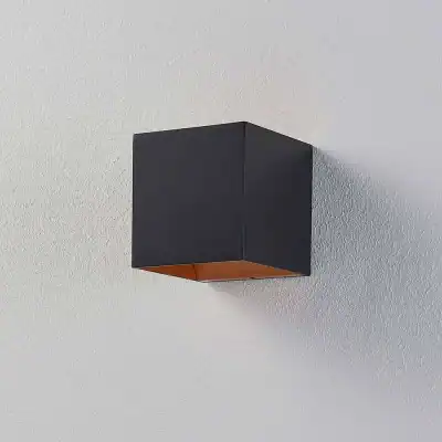 Black wall light fixture with modern design, ideal for medical clinics, optometry shops, and healthcare environments, providing excellent illumination and aesthetic appeal.