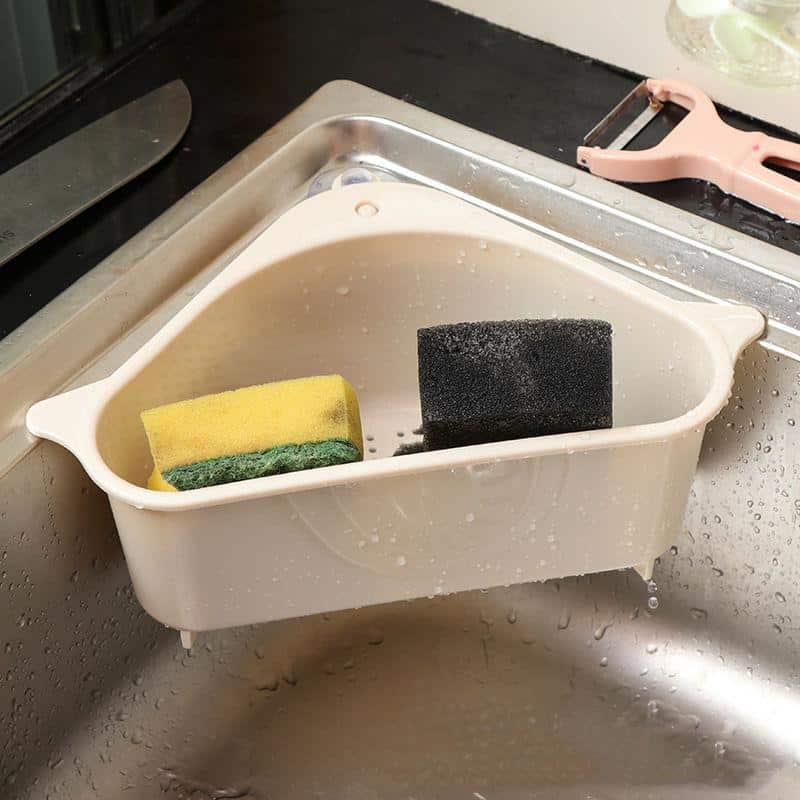 A convenient surgical mask storage container placed in the kitchen sink for easy cleanup and organization.