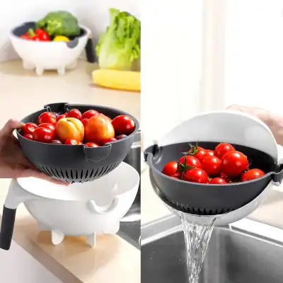 Alt text: Modern kitchen fruit slicer bowl for washing and draining tomatoes, with fresh produce in the background, showcasing a practical kitchen gadget.