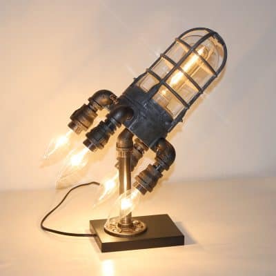 Unique industrial pipe table lamp for modern home decor.
