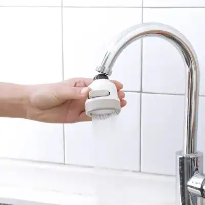 Efficient water filter attached to a kitchen faucet, promoting healthy hydration and eye care. Perfect for maintaining clean water quality in your Monalisa medical or optical clinic.