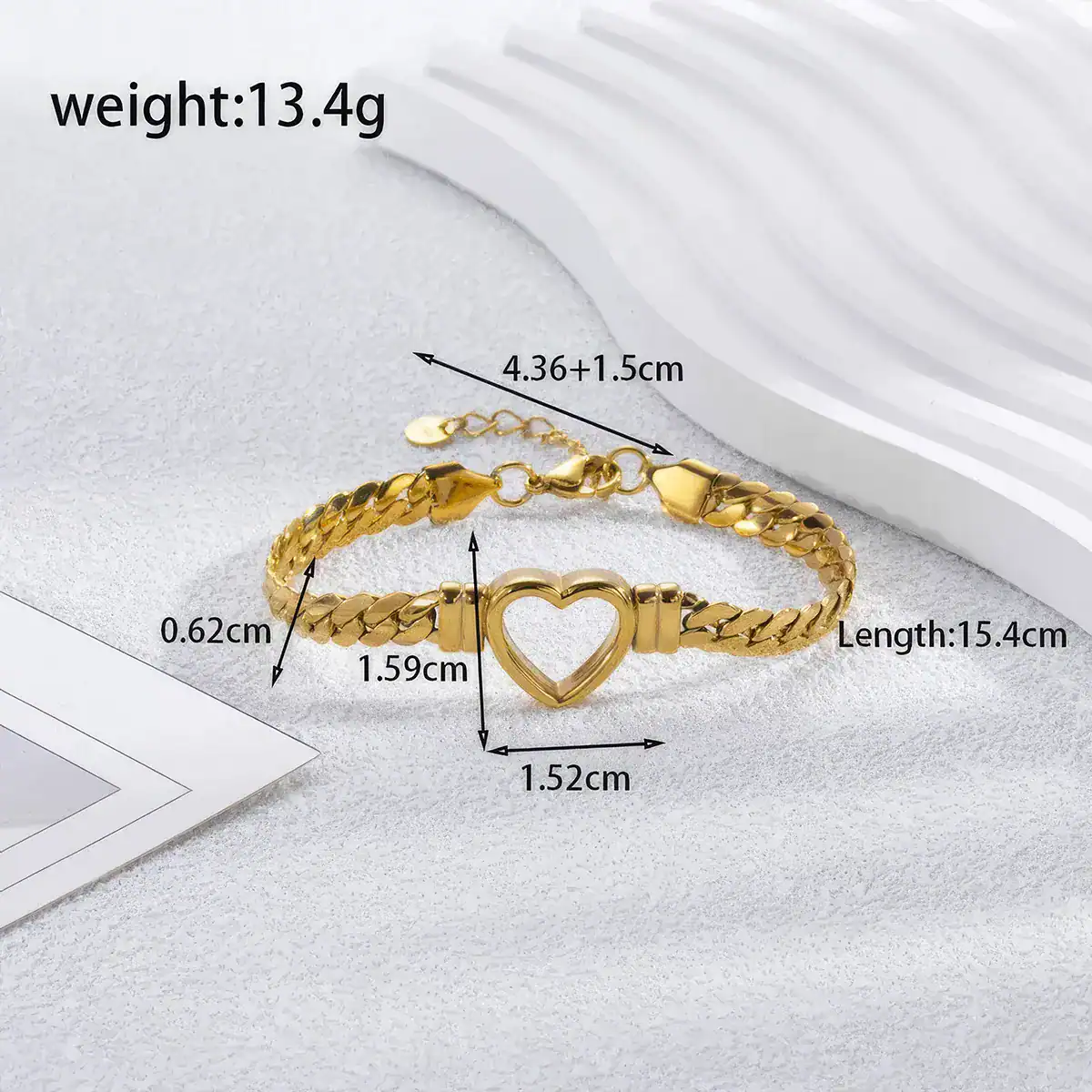 Dainty gold bracelet featuring a heart-shaped centerpiece, adjustable chain, and durable lobster clasp. Perfect jewelry accessory for women seeking stylish and romantic gift options.