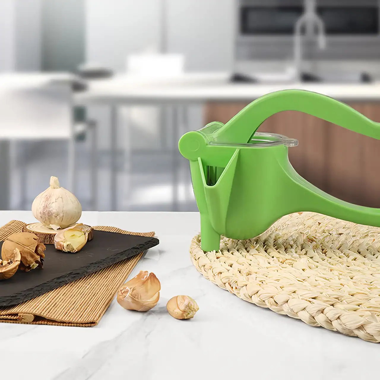 A bright green garlic press placed on a woven mat with garlic cloves and slices nearby, ideal for kitchen use and food preparation at Monalisa Store.