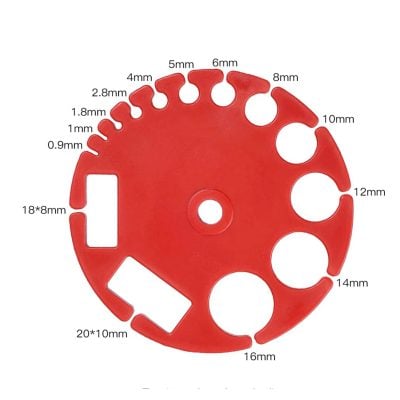 Dental cavity measurement and restoration tool for dental professionals, featuring various hole sizes for filling and cavity preparation.