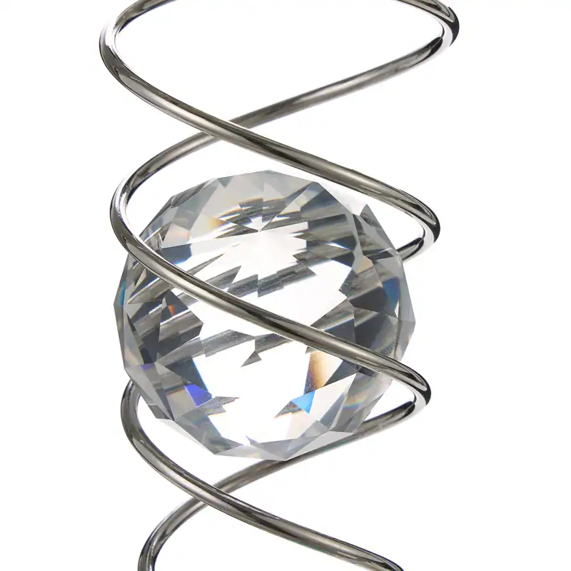 Stunning diamond earring design featuring a large sparkling gemstone wrapped in sleek silver wire, perfect for stylish accessories.