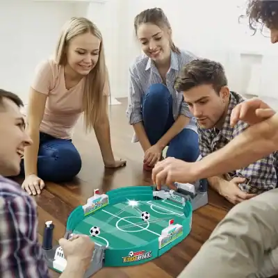 Kids playing tabletop soccer game, perfect for family entertainment and fun in the Monalisa Store.