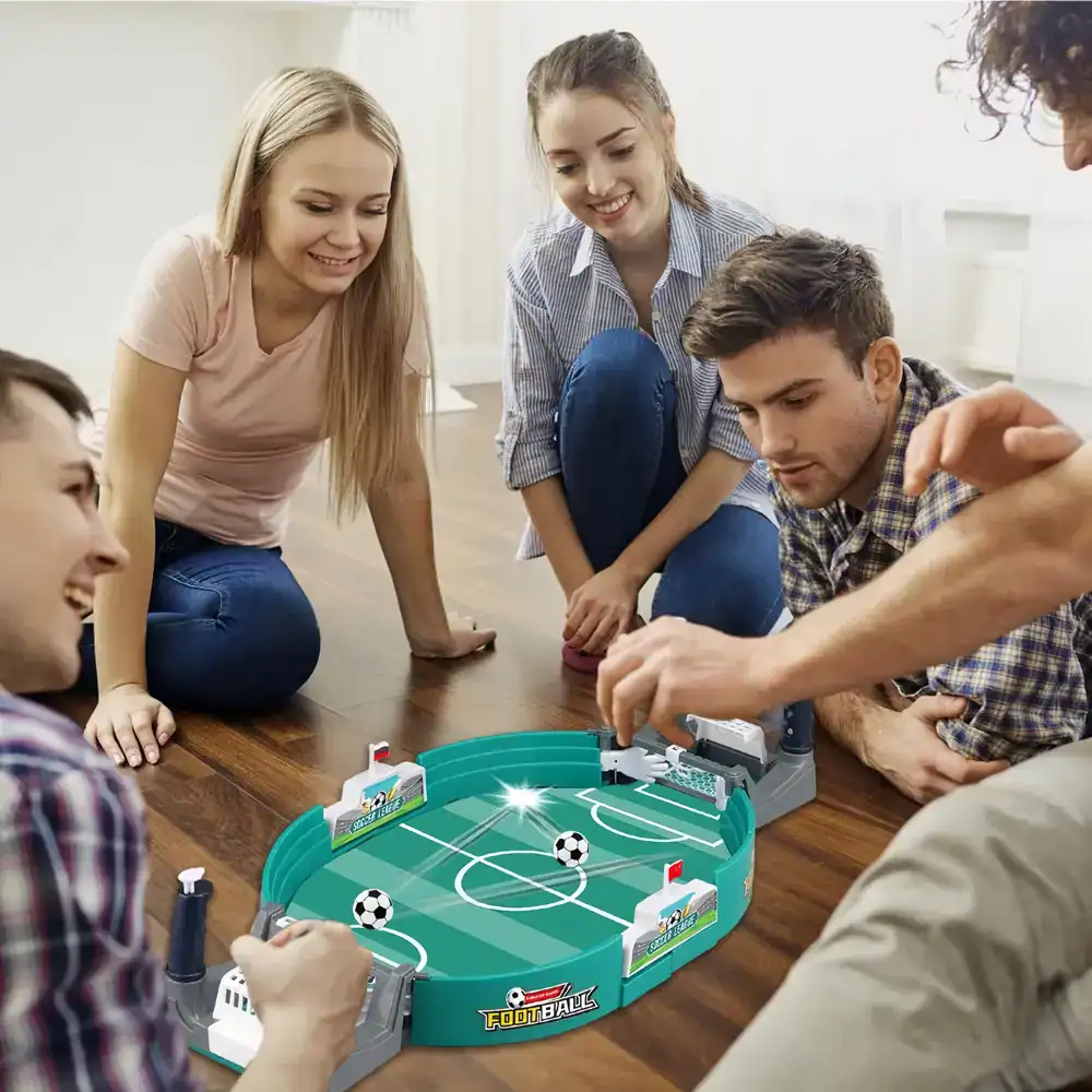 Kids playing tabletop soccer game, perfect for family entertainment and fun in the Monalisa Store.