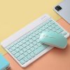 Wireless keyboard and mouse combo in pastel blue for comfortable typing and navigation, perfect for office, home, or study environments.
