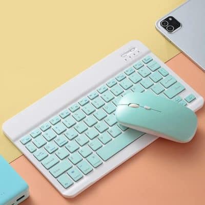 Wireless keyboard and mouse combo in pastel blue for comfortable typing and navigation, perfect for office, home, or study environments.