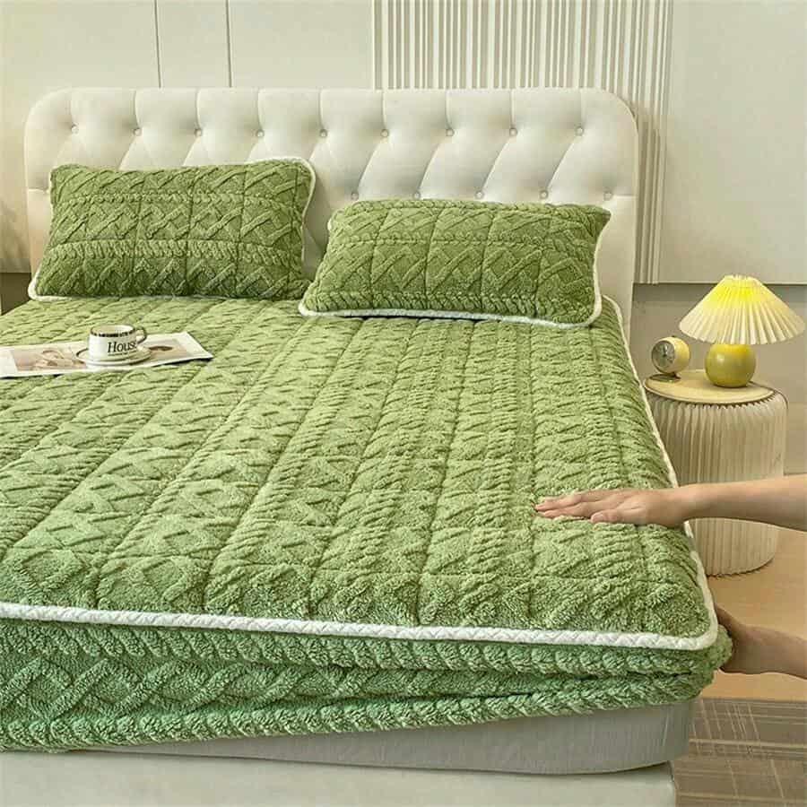 Premium green bed cover with matching pillowcases, soft velvet texture, perfect for bedroom decor and comfort, suitable for home and hotel use.