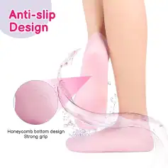 Pink anti-slip gel toe separator for bunions, overlapping toes, and foot pain relief with honeycomb grip bottom for stability and comfort.