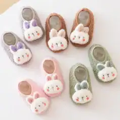 Adorable bunny slippers with plush texture, perfect for kids and women. Comfortable, stylish, and available in pastel colors with cute bunny face designs. Great for home or gift.