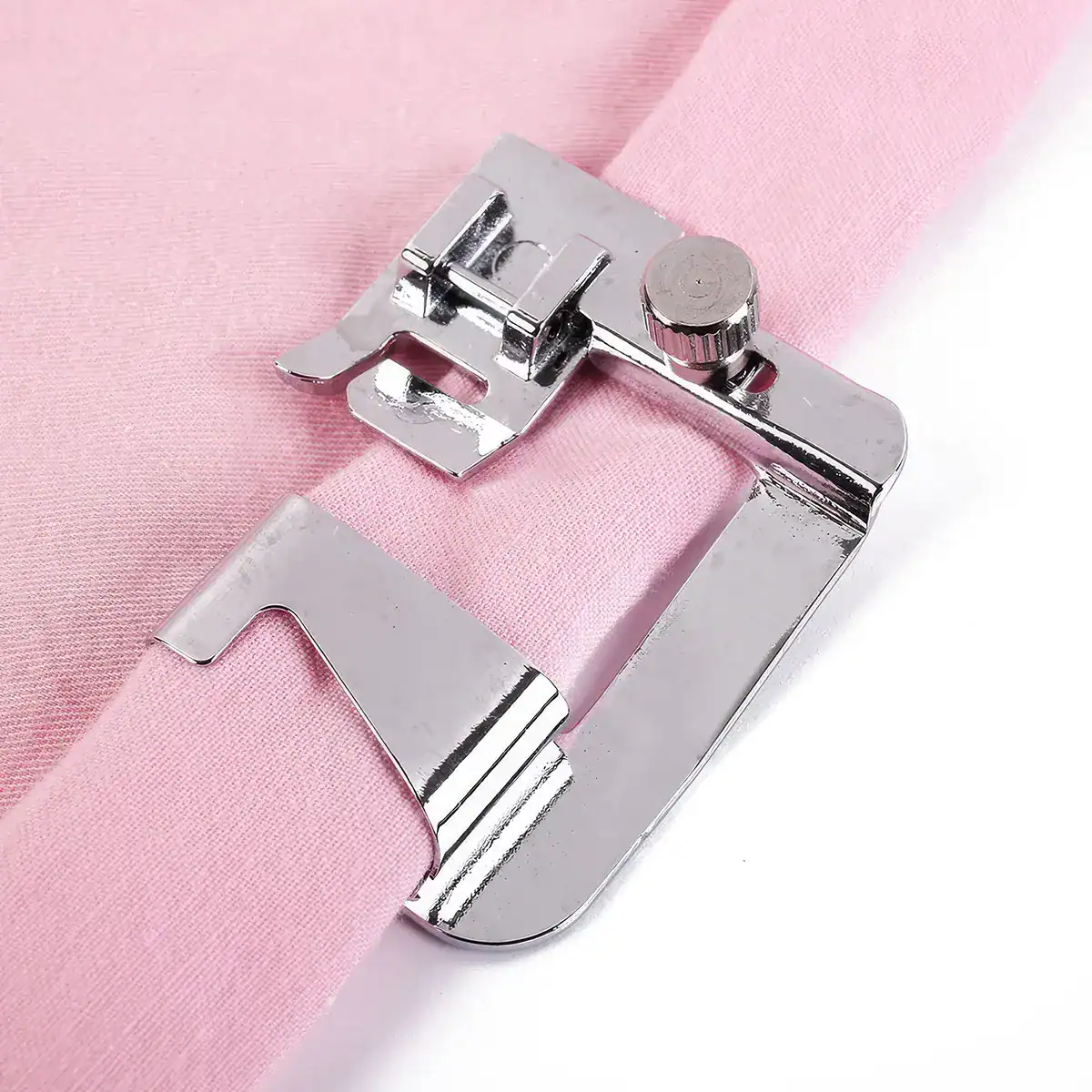 Elevate your beauty or fashion project with high-quality embroidery and sewing tools. Featuring a durable metal presser foot, perfect for intricate stitching on pink fabric. Ideal for beauty salons, fashion designers, and textile professionals seeking precision and efficiency.