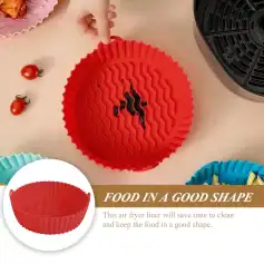 Silicone air fryer liner in red for baking, prevents mess, easy to clean. Compatible with most air fryers, perfect for cooking snacks, fries, and more. Durable, heat-resistant, non-stick.