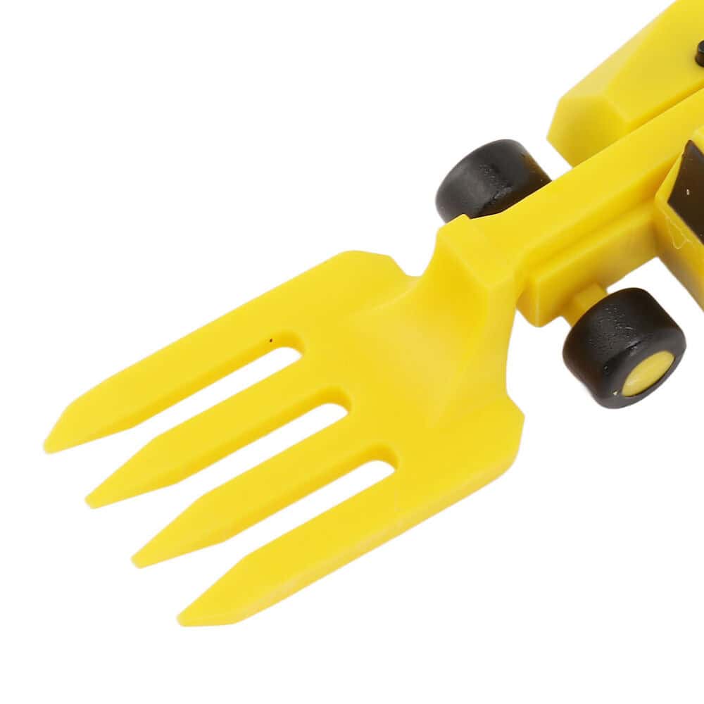 Bright yellow mini gardening fork toy with black wheels, perfect for children to explore gardening and outdoor activities. Durable plastic construction with moving wheels enhances imaginative play.