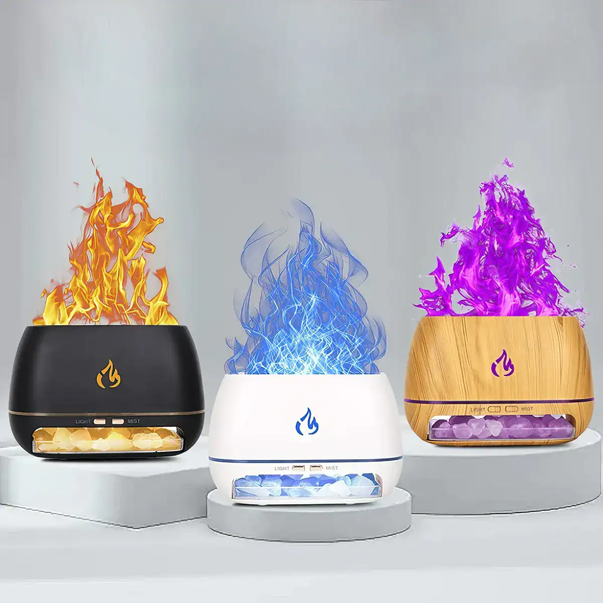 A visually appealing set of three aroma diffusers with colorful flame effects, available in black, white, and wood finish, perfect for enhancing your space with soothing scents and ambient lighting.