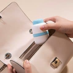 Portable eye massage tool for skincare, easily fits in a handbag, ideal for on-the-go eye health and beauty treatments.