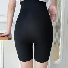 High-waisted black shapewear shorts for tummy control and figure enhancement. Comfortable, seamless, perfect for everyday wear or special occasions.
