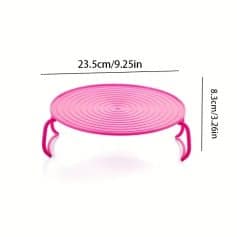 Pink optical lens cleaning stand for glasses and sunglasses.