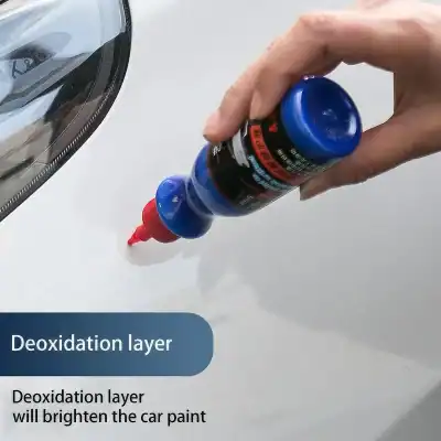 ALT text: Hand applying deoxidizer to car paint near headlight to brighten and restore the vehicle's surface.