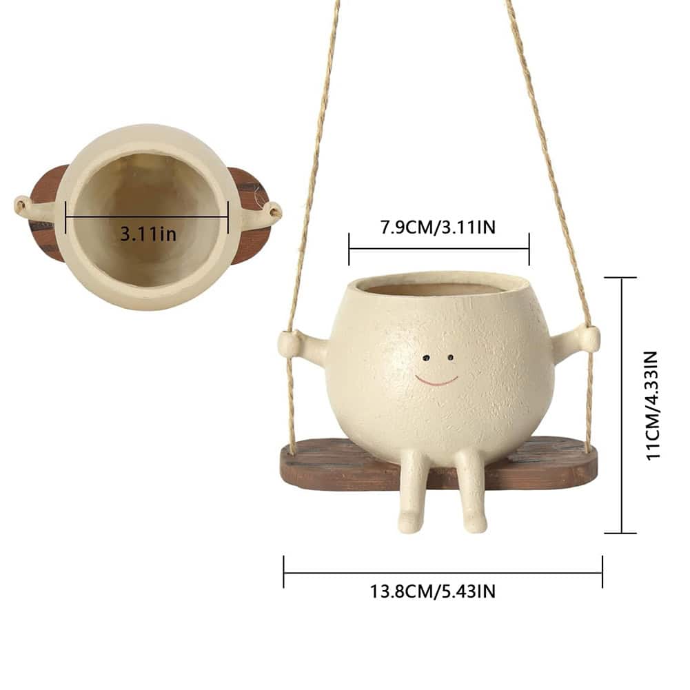 Deluxe ceramic hanging flower pot with smiley face, wood accents, and sturdy rope for indoor or outdoor use.