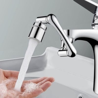 Close-up of a sleek, stainless steel water faucet dispensing water into a person's hand, emphasizing hygiene and modern optical care essentials from Monalisa Medical.