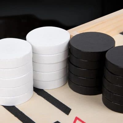 High-quality black and white poker chips for casino and game nights. Durable and professional for all gambling purposes.