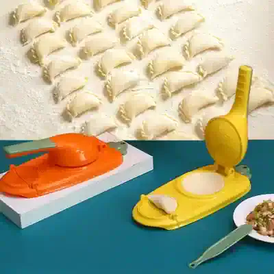 Innovative dumpling maker with shaped molds for perfect dumplings and accessories for easy preparation. Ideal for home and professional kitchens.
