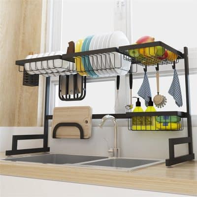 Image of a practical black metal dish rack organizing plates, utensils, and cleaning supplies above a modern kitchen sink. Perfect for kitchen storage, dish drying, and maintaining a tidy countertop.