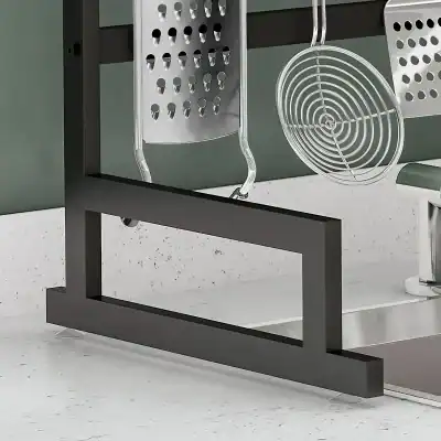 Stainless steel kitchen tool organizer with grater, slicer, and strainer for efficient meal prep. Durable, sleek design ideal for modern kitchens.