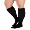 Comfortable black thigh-high compression stockings for improved circulation and support. Ideal for medical, athletic, or everyday wear to promote healthy blood flow.