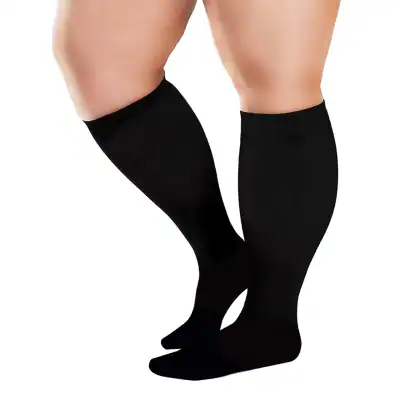 Comfortable black thigh-high compression stockings for improved circulation and support. Ideal for medical, athletic, or everyday wear to promote healthy blood flow.