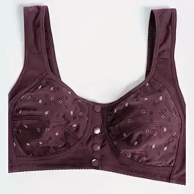 Detailed alt text: Stylish maroon medical bra featuring floral embroidery, adjustable straps, and front closure for enhanced comfort and support, suitable for post-surgical needs.