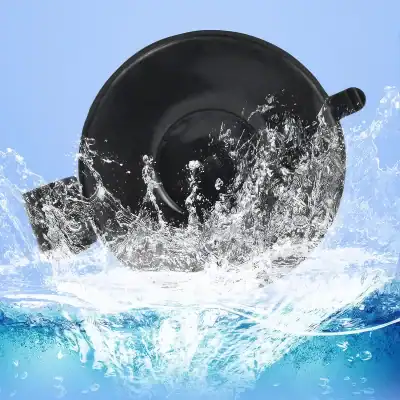 Alt text: Black office mug submerged in water splash, showcasing cleaning or water resistance, suitable for promotional or product display context.