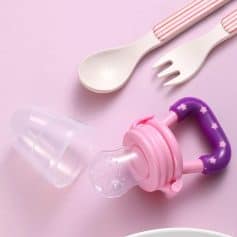Adorable pink baby teething toy with a clear silicone bottle and handle, perfect for soothing infants during teething. Safe and entertaining, ideal for newborns and toddlers.