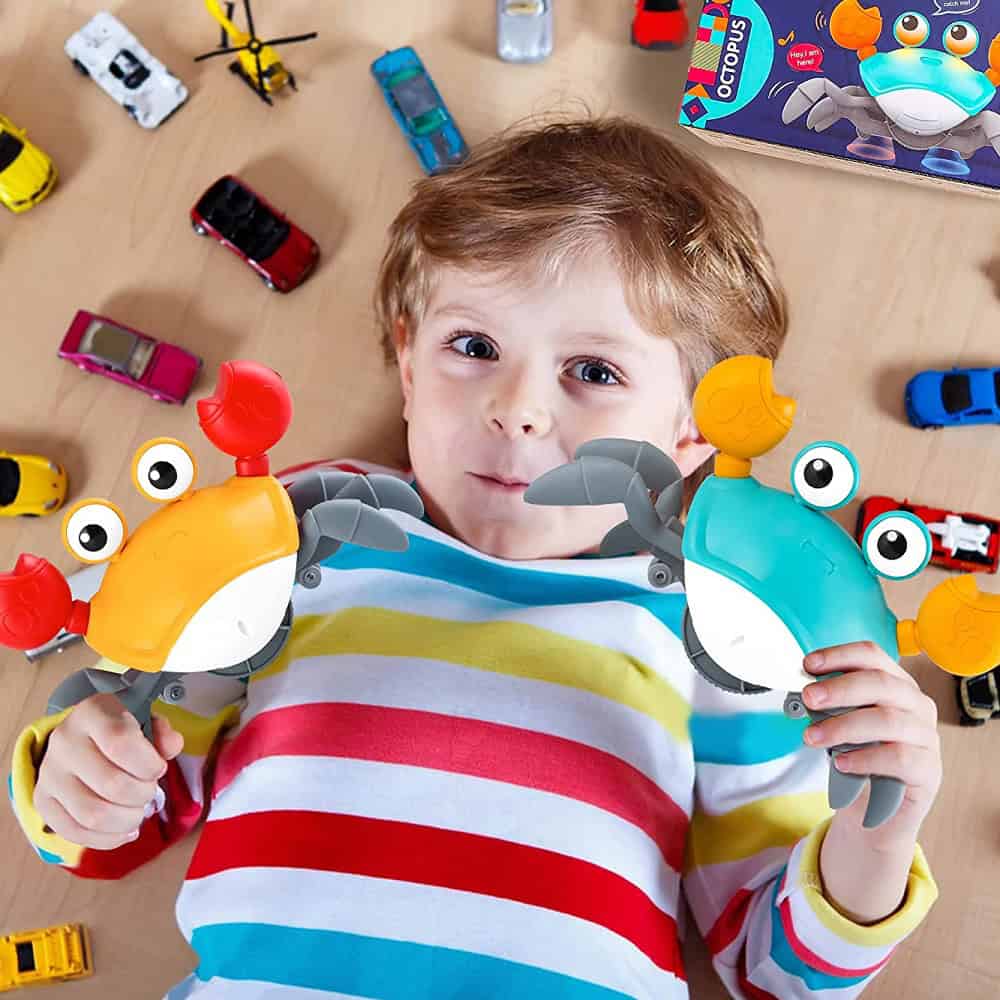 Kids crab-shaped flashlight toys for children, perfect for playtime and bedtime adventures, featuring bright colors, eye-catching design, and safe materials suitable for all ages.