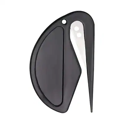 Compact plastic eyeglass cleaner with soft cleaning pad and precision blade for safe removal of dirt, smudges, and dust from prescription glasses, sunglasses, and optical lenses.