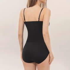 Comfortable black waist trainer for women, seamless bodysuit for slimming and shaping, premium shapewear, plus size options available, everyday wear for a confident silhouette.