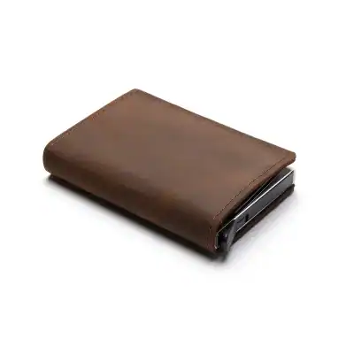 Elegant brown wallet with a hidden built-in slit microcamera for discreet optical work and personal use.