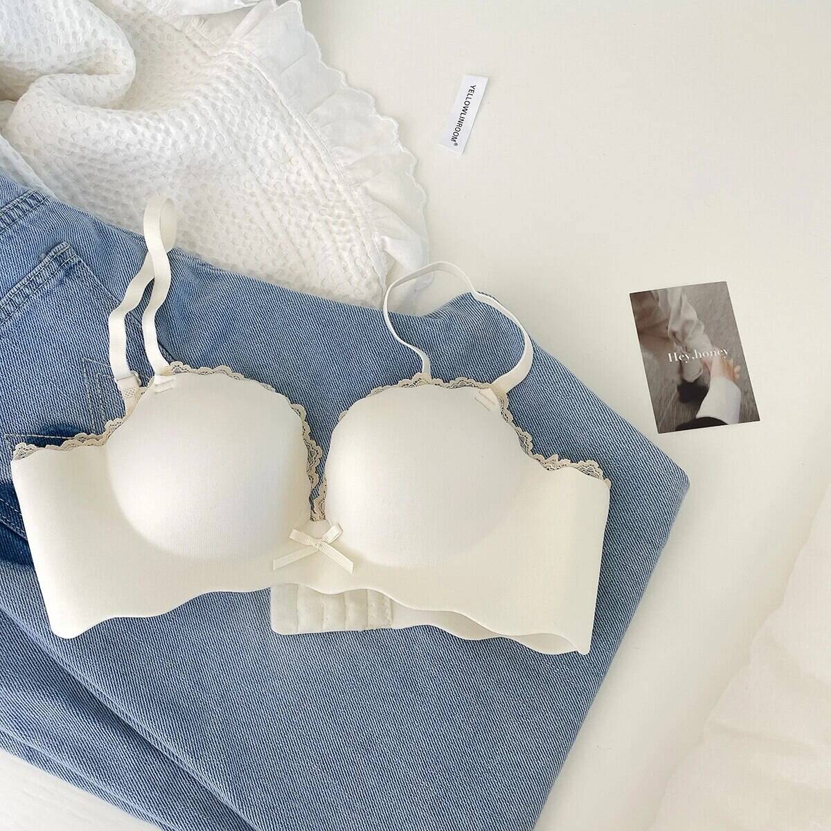 Comfortable white bra with lace trim, perfect for everyday wear and medical use, enhancing confidence and support.