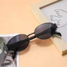 High-quality black sunglasses with tinted lenses, perfect for UV protection and fashion. Ideal for both men and women, available at Monalisa Store for premium optical eyewear.