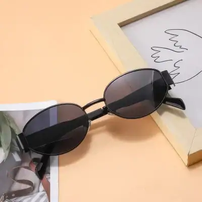 High-quality black sunglasses with tinted lenses, perfect for UV protection and fashion. Ideal for both men and women, available at Monalisa Store for premium optical eyewear.