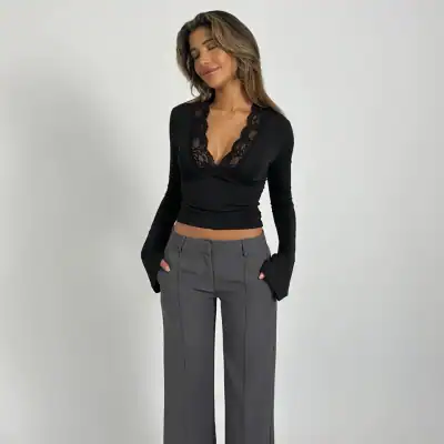 Women’s stylish black lace top with long sleeves and flattering fit,Perfect for fashion-forward looks and casual or semi-formal occasions.