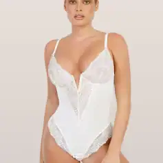 Modern white lace bodysuit with intricate details, perfect for fashion-forward women seeking stylish lingerie and intimate wear.