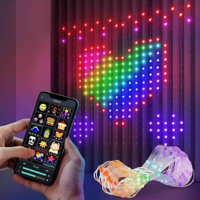 A person using a smartphone app to control vibrant LED heart-shaped wall lights, featuring a remote interface with pixel art icons for customizable lighting decoration.