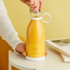 Stylish yellow juice dispenser for fresh beverages, ideal for home or cafe use, with easy pour spout, portable design, 380ml capacity, and modern aesthetic.