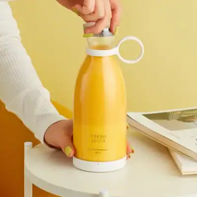 Stylish yellow juice dispenser for fresh beverages, ideal for home or cafe use, with easy pour spout, portable design, 380ml capacity, and modern aesthetic.